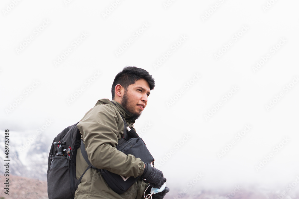 Adventure young man in the mountains.