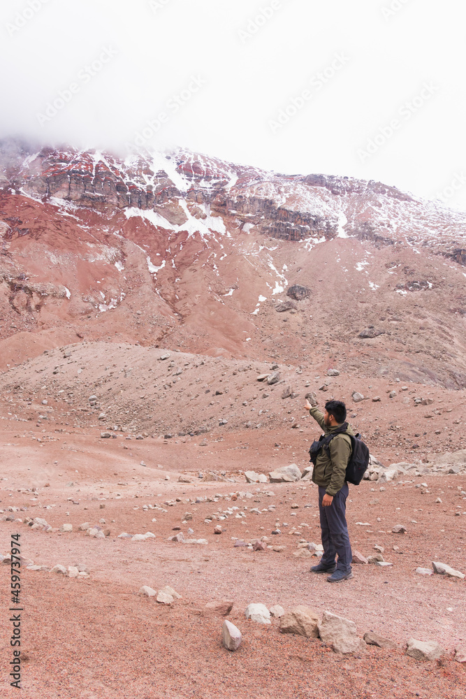 Adventure young man in the mountains.