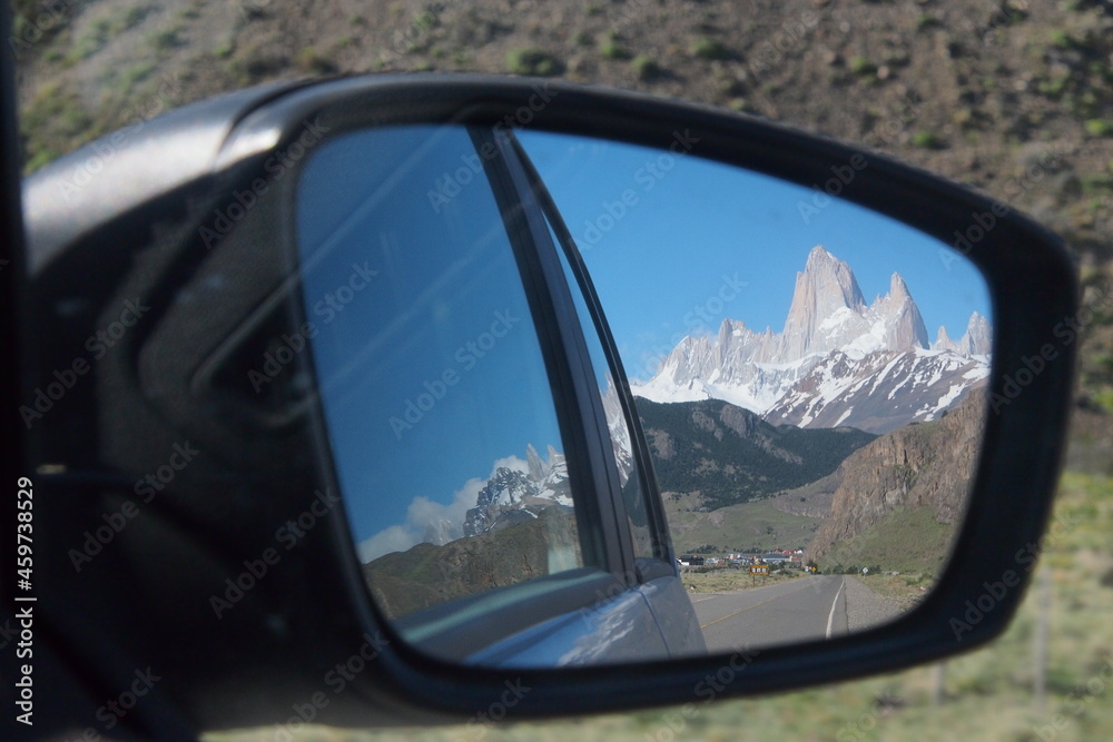 Road trip in patagonia, view in back mirror shows andes mountains