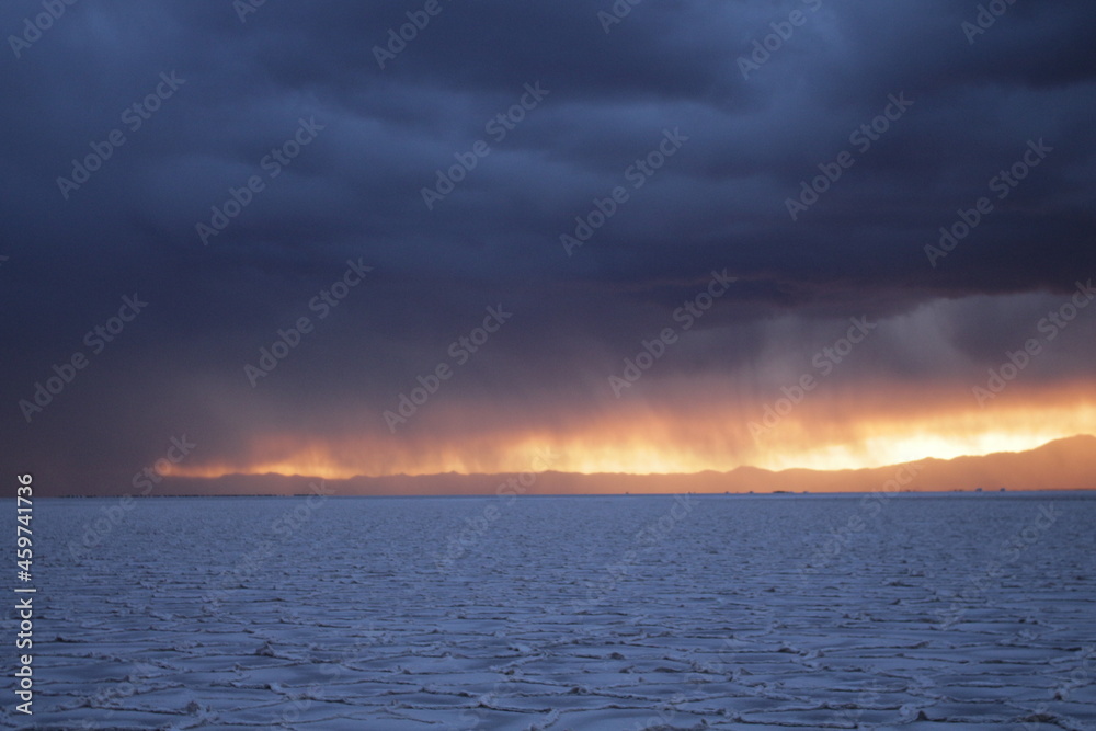 Storm at salt flat desert in northern argentina Storm at salt flat desert in northern argentina
