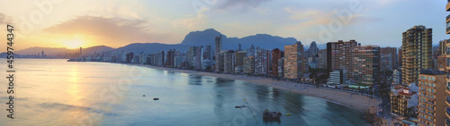 large panorama of the city Benidorm Alicante in Spain with tall buildings at sunset