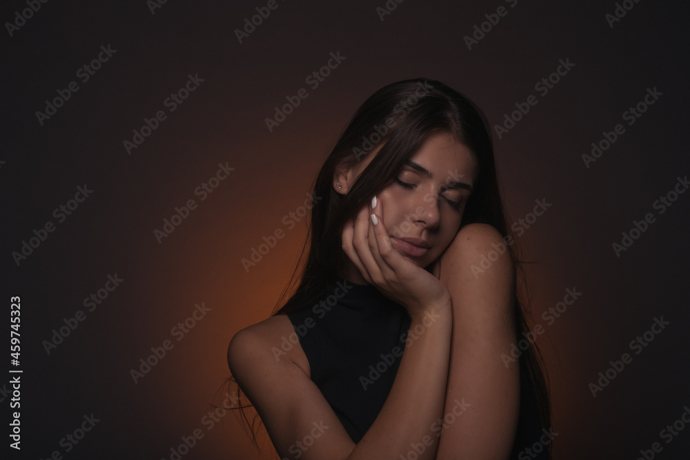 Portrait of girl posing with her eyes closed