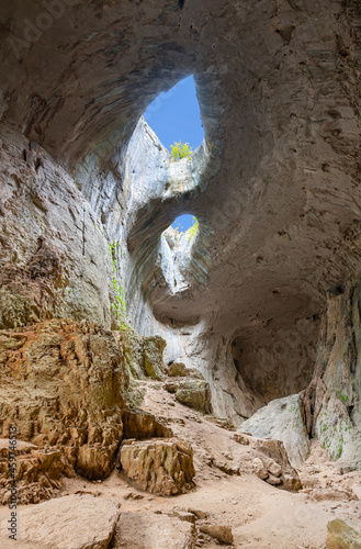 God's eyes in Prohodna cave, Bulgaria photo