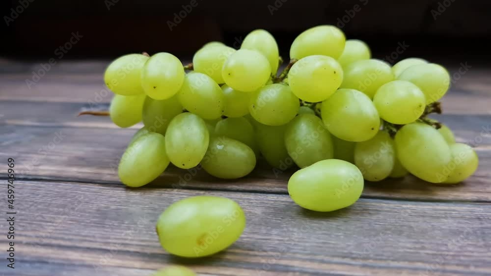 The Natural fresh green grapes close-up. Bunch of grapes. The Natural fresh green grapes close-up. Bunch of grapes.