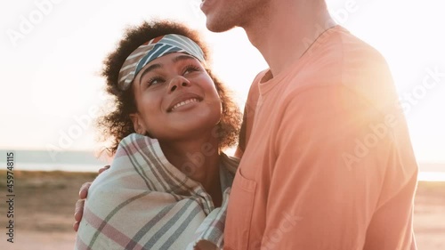 Close-up view of a couple in love hugging each other in nature photo