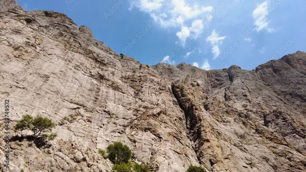 Huge steep cliffs, a canyon on the Euphrates River, Dramatic geological wonder. Beautiful background and unusual landscape, 4k gimbal shoot Huge steep cliffs, a canyon on the Euphrates River, Dramatic geological wonder. Beautiful background and unusual landscape, 4k gimbal shoot