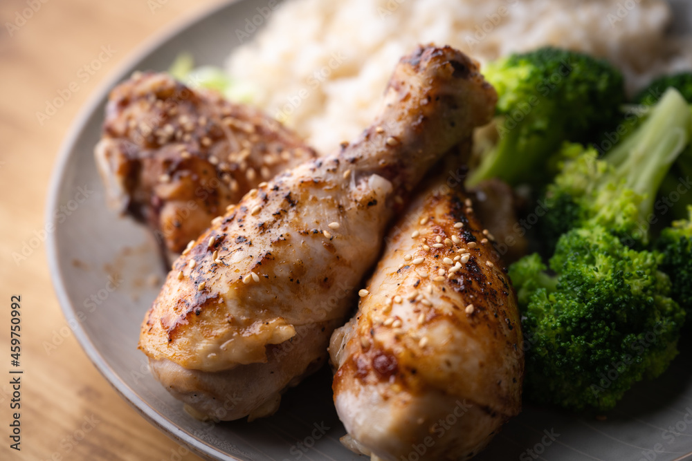 teriyaki chicken drumsticks with broccoli and brown rice