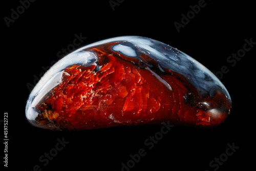 Macro mineral stone Cornelian on a black background photo