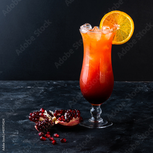 Making Tequila Sunrise Cocktail Glass with cocktail Sex on the Beach