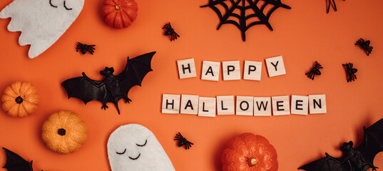 Top view of Halloween decoration with text happy halloween. Party, invitation, halloween decoration concept. Flat lay, overhead, copy space, banner.
