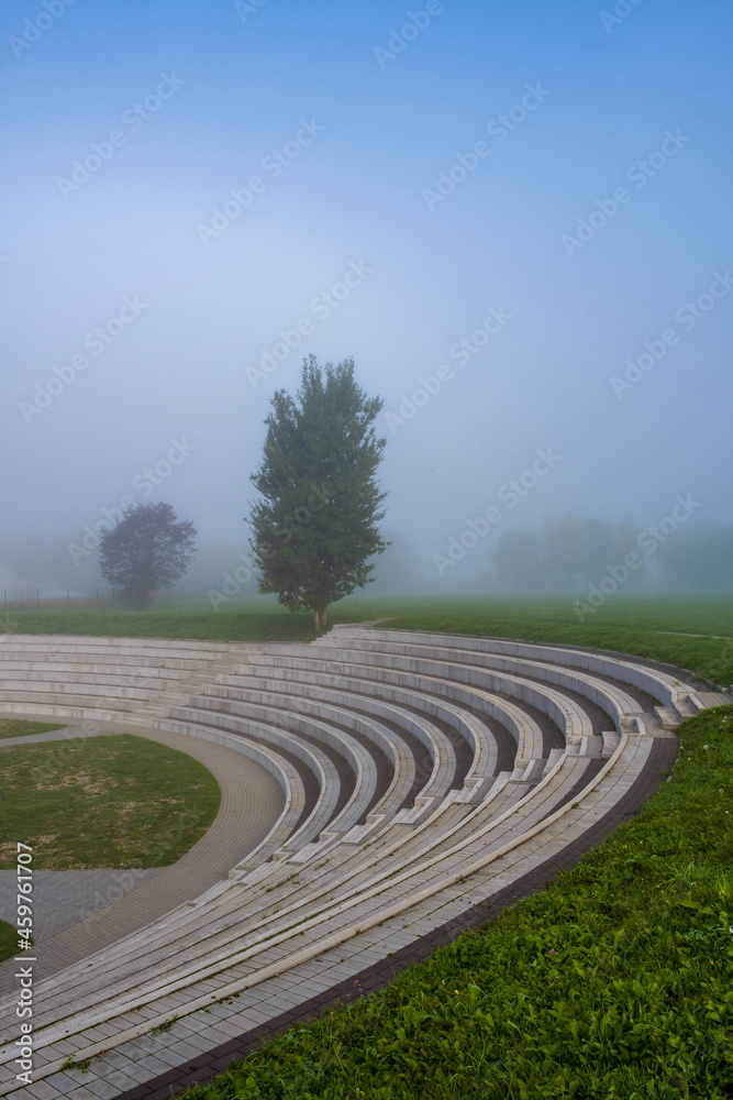 An amphitheater in the early foggy morning in the ancient city of Suzdal. An amphitheater in the early foggy morning in the ancient city of Suzdal.
