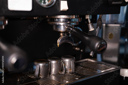 details of dark loft coffee shop. professional coffee machine close up.