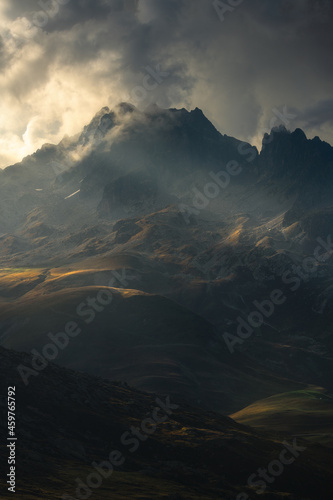 Beautiful dramatic light behind and on the mountains of the French Alps.