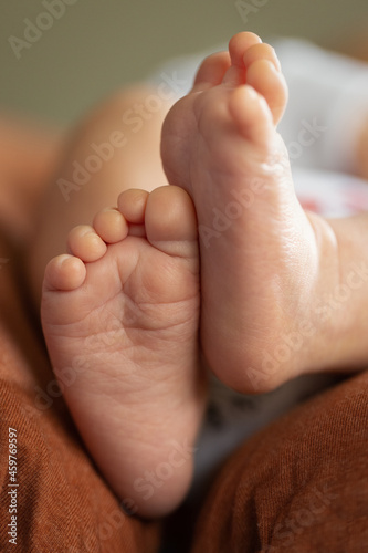 Small feet of a newborn
