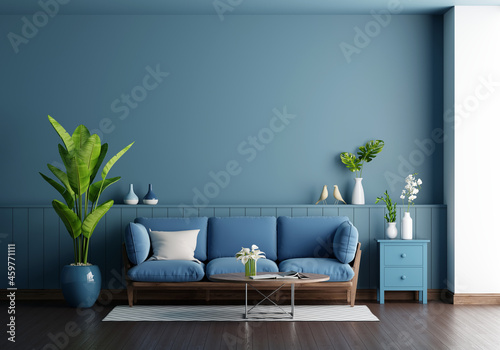 Blue sofa in blue living room with copy space, 3D rendering