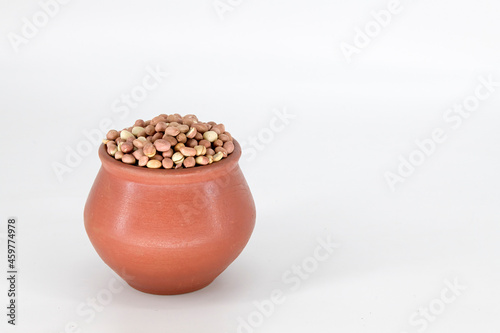 Selective focused Indian health snack roasted peanuts with salt on an isolated white background. Roasted without oil and very healthy daily snacks, Tamilnadu, Mumbai, Delhi, Kerala. photo