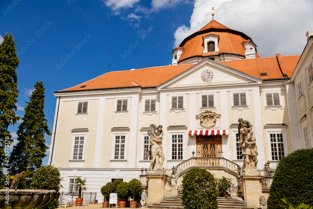 Vranov nad dyji, Southern Moravia, Czech Republic, 03 July 2021: entrance to baroque and gothic medieval castle on hill at sunny summer day, courtyard with antique statues, stairs next to fountain