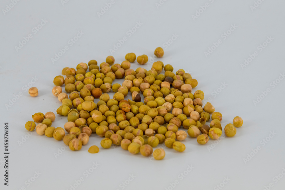 Selective focused Indian crispy salted fried and roasted green peas or peas. Also called pattani