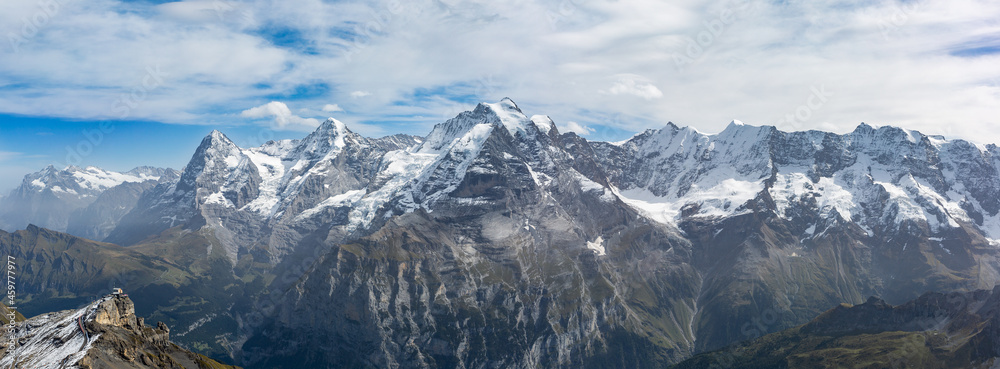 Wide angle view of the Bernese Oberland mountains, the Eiger, Monch and Jungfrau, view from the top of the Schilthorn.