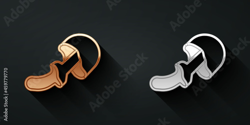 Gold and silver Psilocybin mushroom icon isolated on black background. Psychedelic hallucination. Long shadow style. Vector