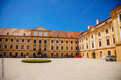 Jaromerice nad Rokytnou, Bohemia, Czech Republic, 06 July 2021: Baroque romantic chateau with park, medieval renaissance castle at summer sunny day, geometrically trimmed green bushes in garden