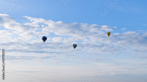 How to travel during quarantine. Hot air balloon. Colorful hot-air balloons flying over the fields
