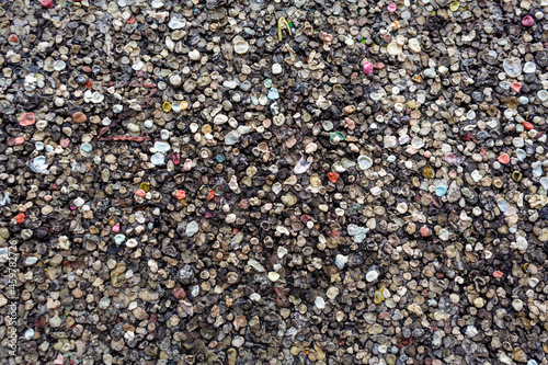 The texture of the landmark Berlin Wall is covered with chewing gum © Kate