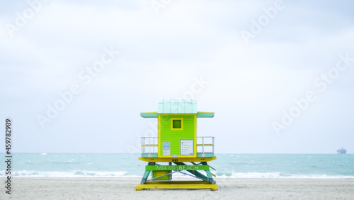One of the iconic lifeguard towers of Miami Beach, this one in green, blue, and yellow. © Bridget