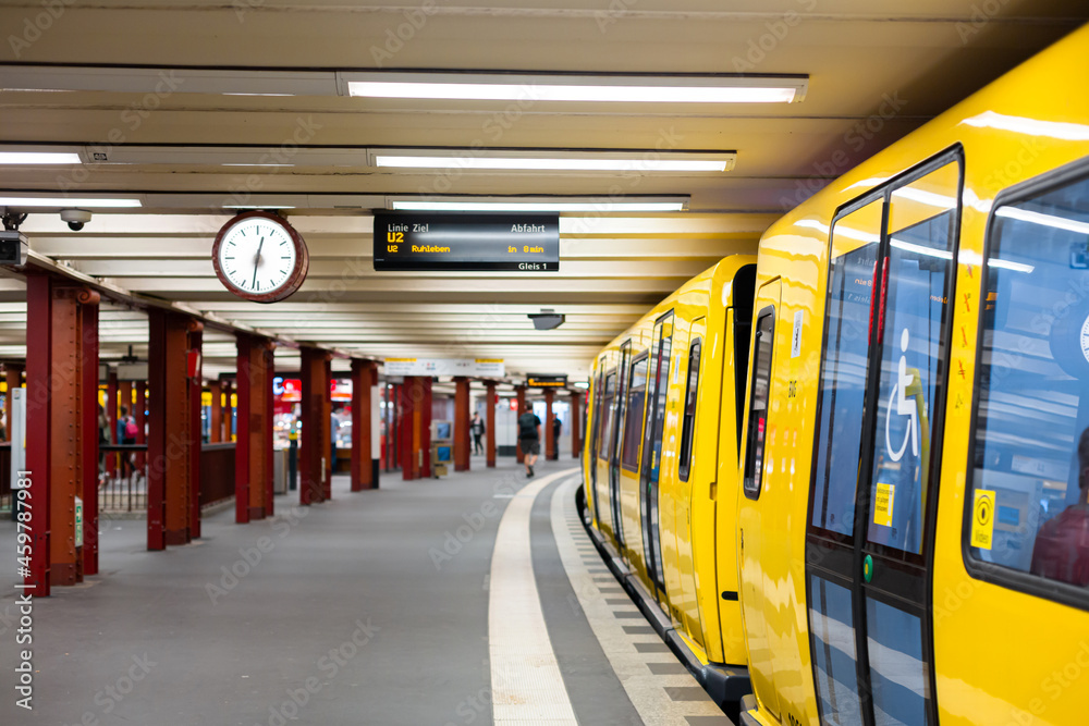 Modern subway. Yellow train at the station