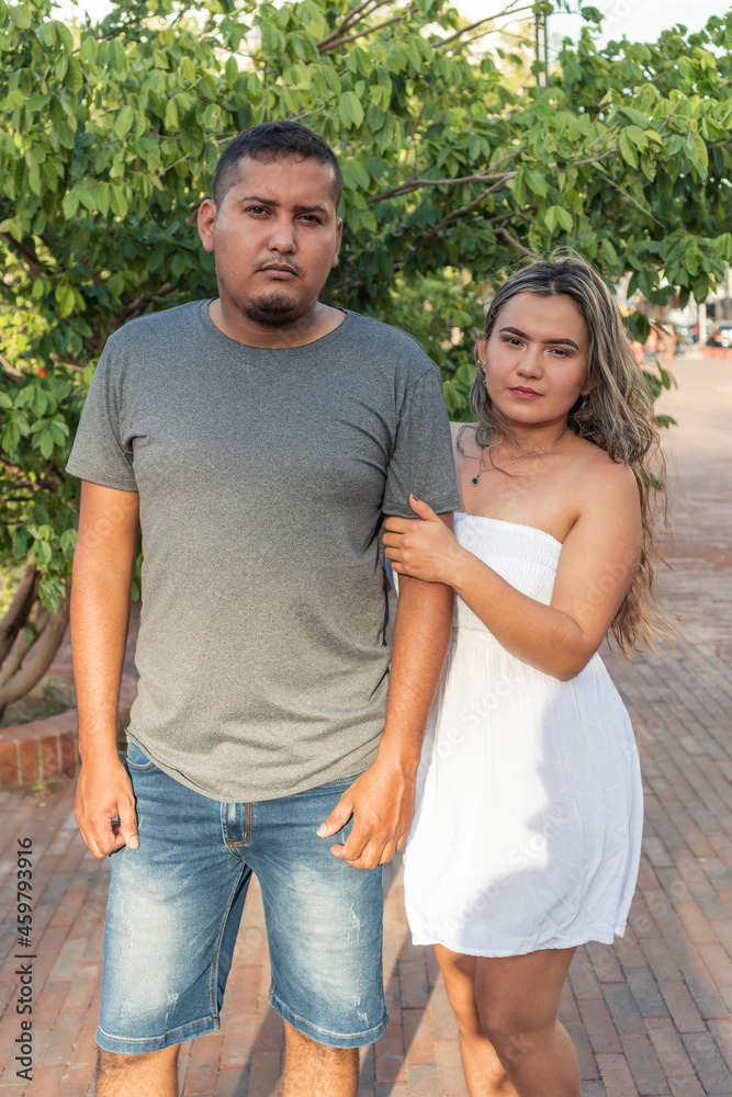 Outdoor image of a hispanic couple in the park