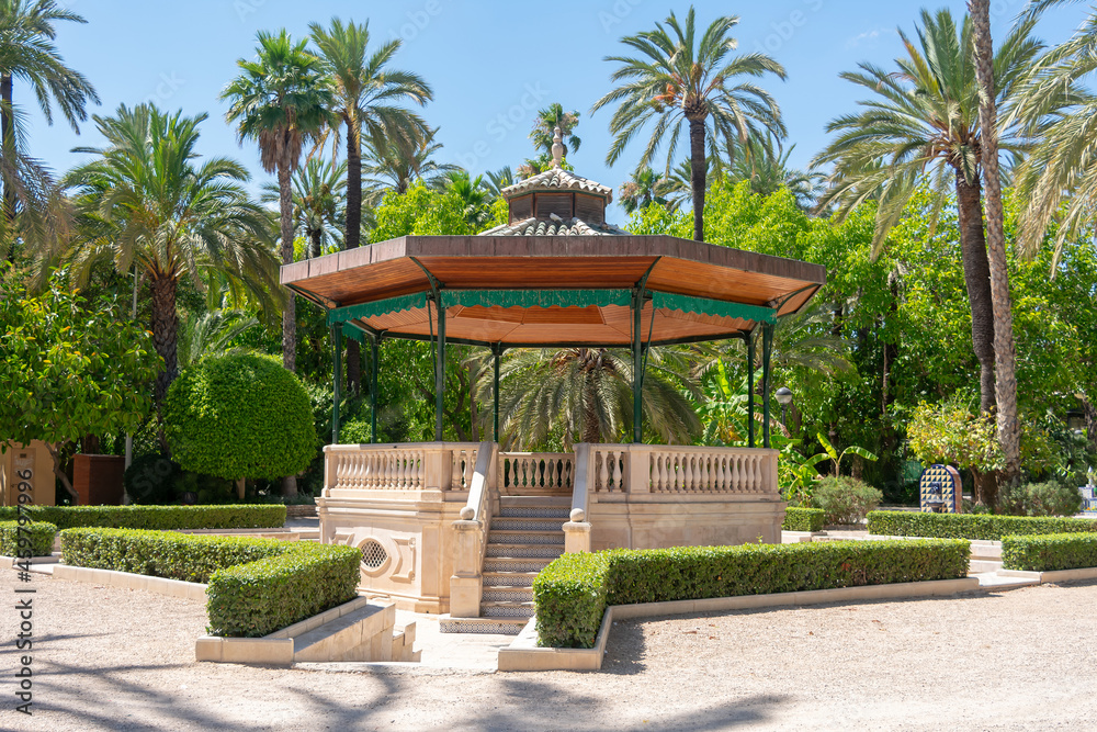 Templete in the Municipal Park of Elche, province of Alicante, Valencian Community. Spain. Europe. The largest date forest in Europe, with almost 200,000 palm trees in gardens throughout the city.
Templete in the Municipal Park of Elche, province of Alicante, Valencian Community. Spain. Europe. The largest date forest in Europe, with almost 200,000 palm trees in gardens throughout the city.