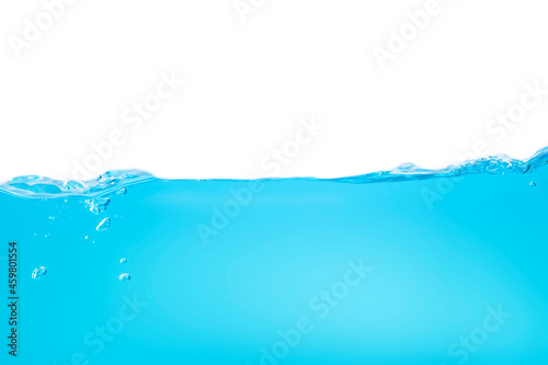 Water waves make bubbles and splashes in the clear blue water. Bubbles in blue liquid
