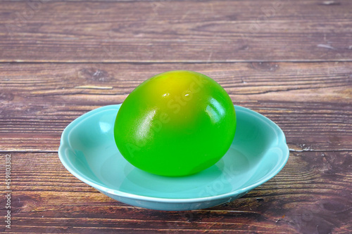 Colorful Bouncy eggs. Funny experiment for kids, The egg becomes bouncy as a result of a chemical reaction between the eggshell and the vinegar. Science classroom photo