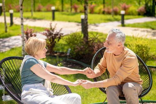 Romantic couple enjoying each other company outdoors