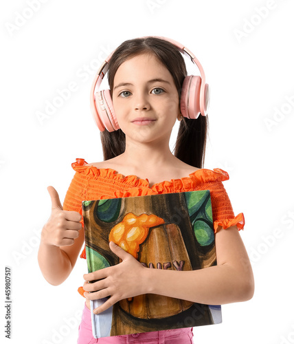 Little girl with headphones...