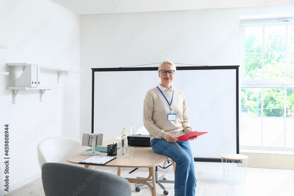 Portrait of mature businesswoman in office Portrait of mature businesswoman in office