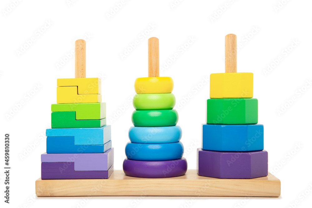 Bright coloured stacking toy for toddlers front view. Concept of Montessori kindergarten, Waldorf kindergarted, Early Childhood Eduation, Special needs education. Isolated background. Isolated Bright coloured stacking toy for toddlers front view. Concept of Montessori kindergarten, Waldorf kindergarted, Early Childhood Eduation, Special needs education. Isolated background. Isolated