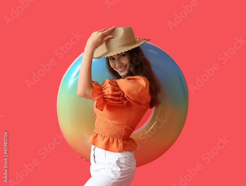 Young woman with inflatable...