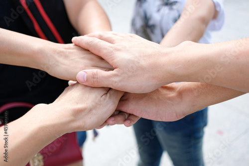hand of people working assemble corporate meeting show symbol Join forces teamwork quality and effective personnel Concept organizational development in teamwork and business