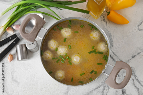 Pot with tasty meatball sou...