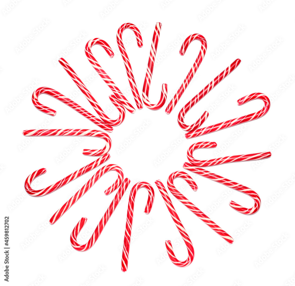 Frame made of candy canes on white background Frame made of candy canes on white background