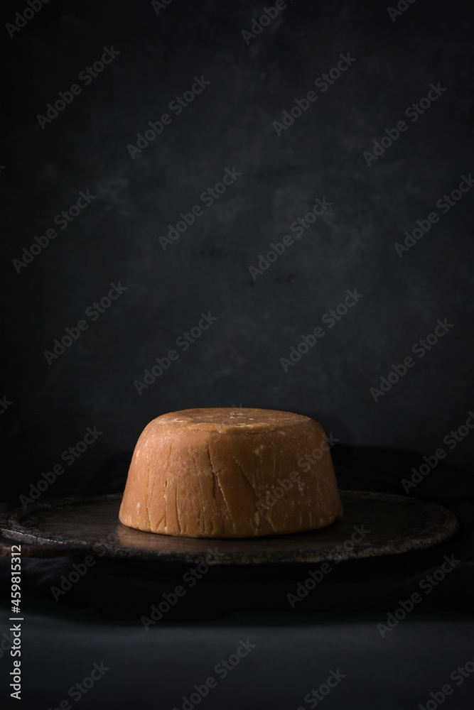 Jagiri jaggery, golden brown color, cup shaped unrefined sugar product also ...