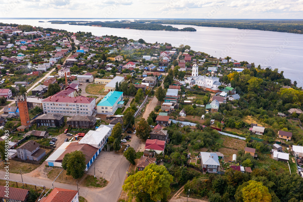 Summer view from drone of small Russian town of Kozmodemyansk in Mari El Republic on banks of Volga 
