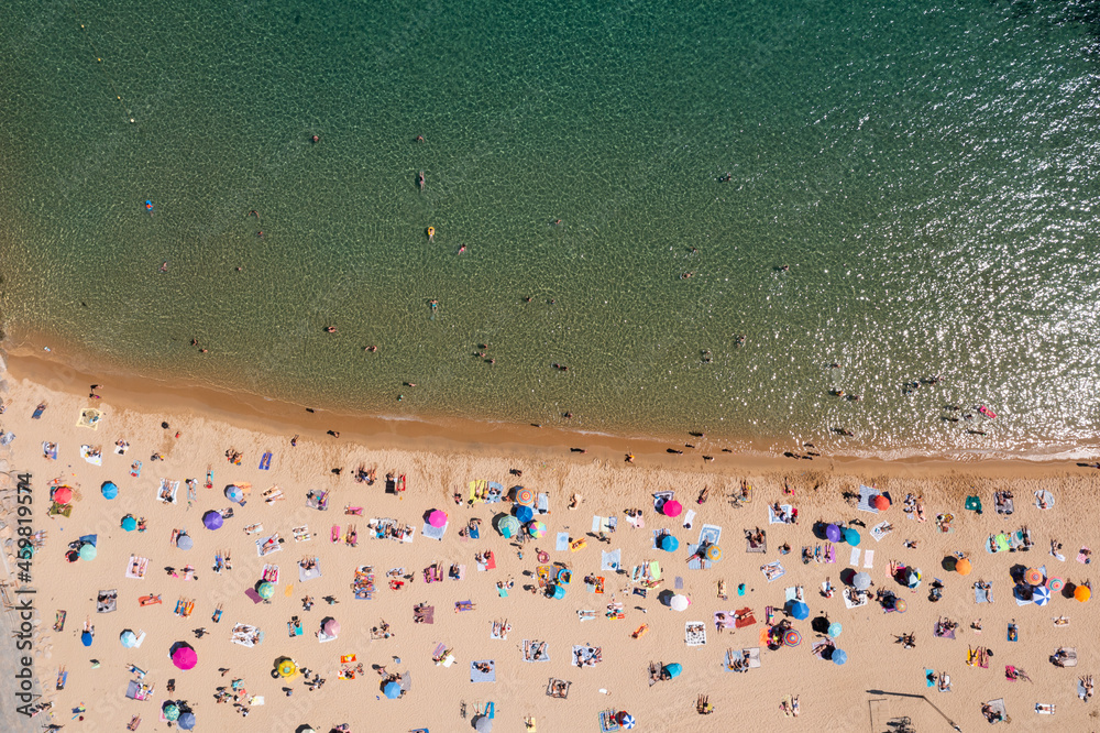 Aerial view of Mediterranean beach of Barcelona at sunny summer day