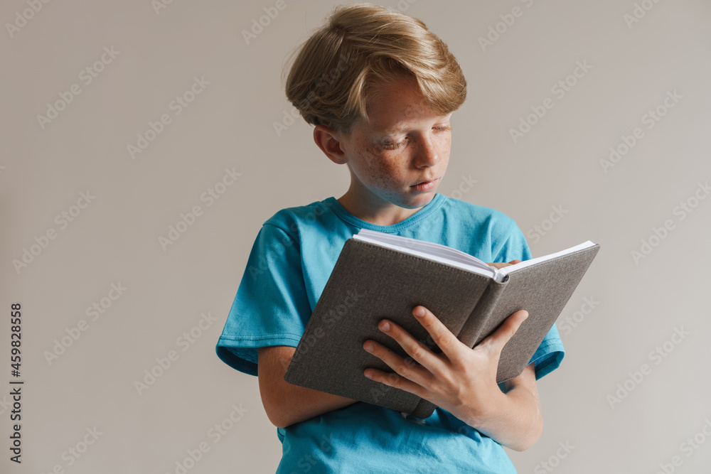 Portrait of a casual preteen boy in t-shirt standing Portrait of a casual preteen boy in t-shirt standing