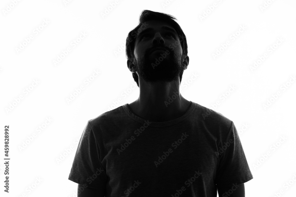 man posing in the shadows anonymous studio man posing in the shadows anonymous studio