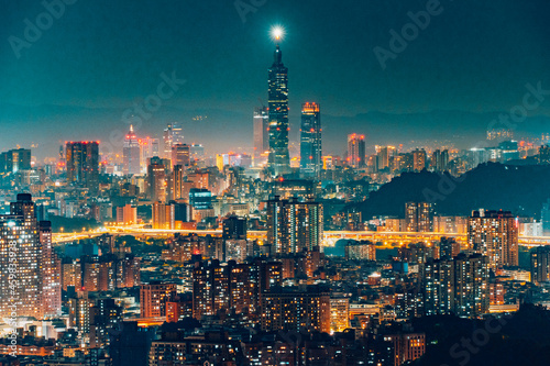 city skyline at night wuth Taipei 101