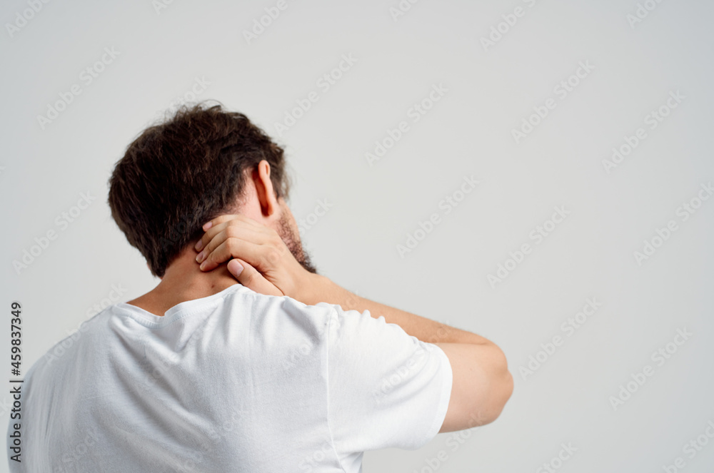 emotional man holding neck arthritis health problems studio treatment emotional man holding neck arthritis health problems studio treatment
