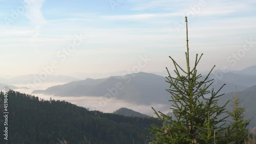 Panorama of mountains in the rays of the morning sun.