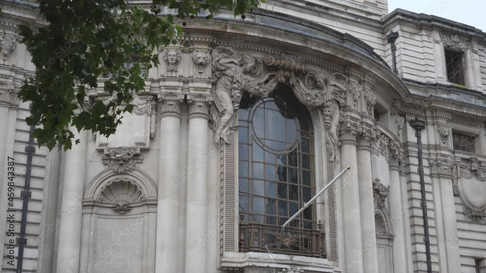 A massive window on an old building. A massive window on an old building.